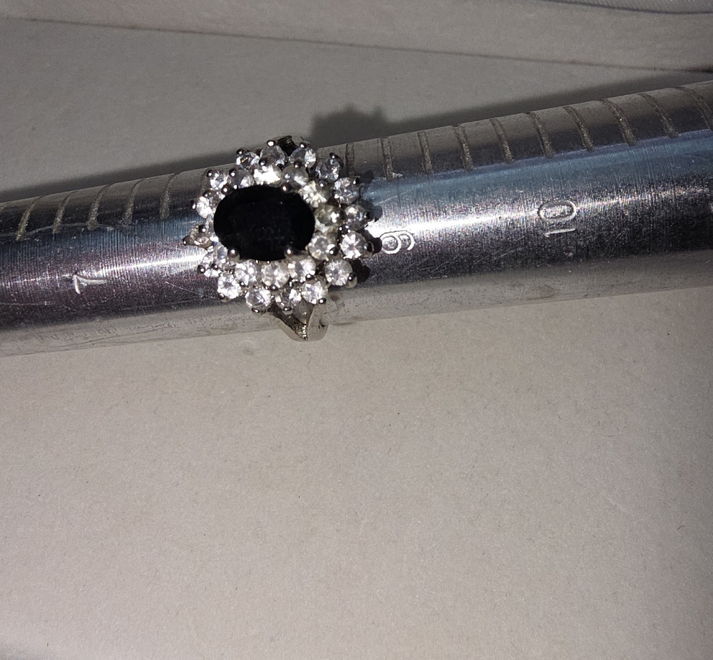 Silver Ring with Black Center Stone and Clear Halo
